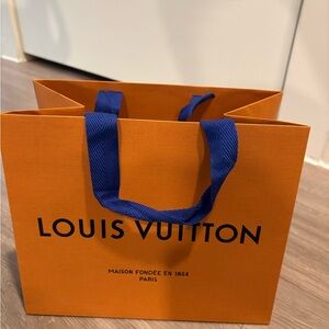 Louis Vuitton Bold Orange Bag with Blue Handles